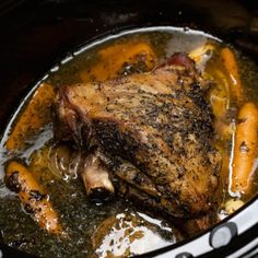 a pork roast with carrots and potatoes in the slow cooker