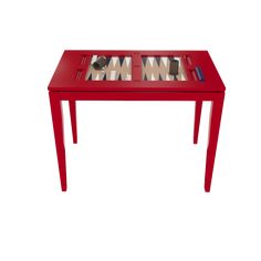 a red table with two trays on it