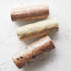 three pieces of bread sitting on top of a white counter