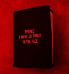 a red book with the words people i want to punch in the face on it