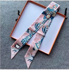 100% Silk Can Be styled around a handbag, tied around the wrist, neck, or hair Silk Scarf On Purse, Wrist Silk Scarve Bracelets, Twillyscarf Wrist Bracelet, Purse Twilly, Bag Twilly, Twilly Scarf, Twilly, Silk, Hair