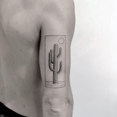 a man with a cactus tattoo on his arm