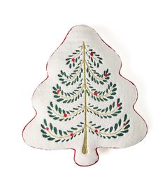 an embroidered christmas tree on a white background