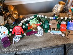 some christmas decorations are on a wooden table