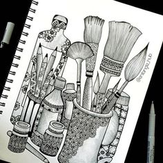 a drawing of brushes and other items in a vase