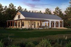 a small house with a porch and covered patio