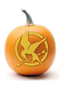 a pumpkin with the symbol of an arrow and a bird on it's side