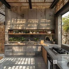 an outdoor kitchen with lots of counter space and open shelving on the wall next to the stove