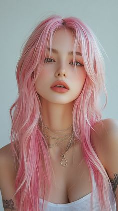 a woman with pink hair and piercings on her chest wearing a white top is posing for the camera