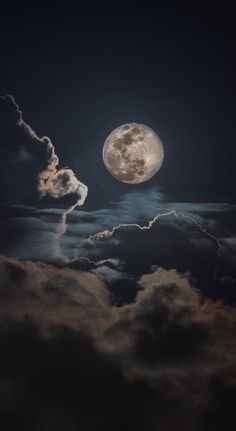 the full moon shines brightly in the dark night sky above some fluffy clouds,