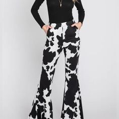 Brand New With Tags Black Cowprint Flare Pants Chic Printed Trousers, Fitted Printed Black Bottoms, Fitted Black Printed Bottoms, Chic Printed Fall Pants, Chic Printed Pants For Fall, Chic Black Printed Pants, Chic High-waisted Printed Pants, Black Stretch Printed Pants, Chic Printed Workwear Pants