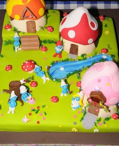 there is a cake that looks like mushroom houses