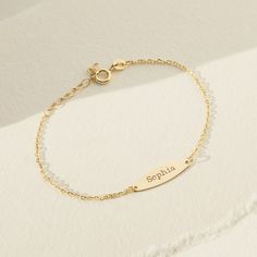 Celebrate your baby girls special day by gifting her with this beautiful thing engravable bracelet. A lightweight 5" bracelet crafted from 14k yellow gold that will fit safely and comfortably around your little girls small wrist. She will love to wear this toddlers engravable bracelet wherever she goes. Gift box included with. purchase. Kids Gold Jewelry, Kids Bracelet, Medical Bracelet, Kids Bracelets, Baby Bracelet, Personalized Bracelet, Id Bracelets, Engraved Bracelet, Childrens Jewelry