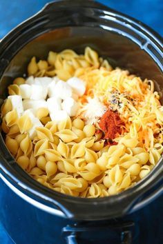 the ingredients for this pasta dish are mixed together in a slow cooker to make an entree