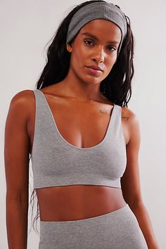 From Intimately's new line of undeniably soft, seamless fabrications. Designed in a super comfy natural LENZING™ Modal fabrication, this scoop-neck bralette has a lightweight, almost cloud-like feel. **Fit:** Bralette style, pull-on design **Features:** Super soft, natural LENZING™ Modal fabrication, scoop neckline, thick straps, stretchy underband **Why We | Softest Soft Scoop Bralette by Intimately at Free People in Grey, Size: XS/S Scoop Neck Seamless Bra For Loungewear, Loungewear Seamless Scoop Neck Bra, Light Support Scoop Neck Bra For Loungewear, Scoop Neck Bra With Light Support For Loungewear, Loungewear Bra With Seamless Construction, Seamless Low-cut Bra For Loungewear, Seamless Solid Color Bra For Loungewear, Seamless Solid Sports Bra For Loungewear, No-show Seamless Bra For Loungewear