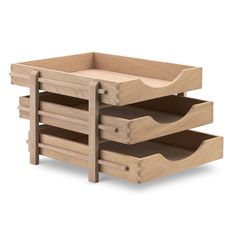 three wooden trays stacked on top of each other with one drawer open and the other closed