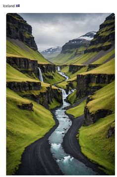 a river running through a lush green valley