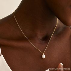 GREAT GIFT OPTION with style for your family, friends, and bridesmaids with CLASSIC MINIMALIST DESIGN This jewellery is made from genuine freshwater pearls, it's perfect for any occasion, whether you're dressing up for a special event or just want to add a touch of elegance to your everyday look. It makes a thoughtful and unique gift for birthdays, anniversaries, or any special occasion. D E T A I L S * Material: High Quality Solid Copper * Finish: 18K Gold/ 925 Sterling Silver * Size: About 16' Gold Pearl Necklace Wedding, Single Pearl Necklace Gold, Necklace For Bride, Pearl Necklace Gold, Single Pearl Necklace, Pearl Drop Necklace, Single Pearl, Pearl Necklace Wedding, Etsy Bridesmaid Gifts