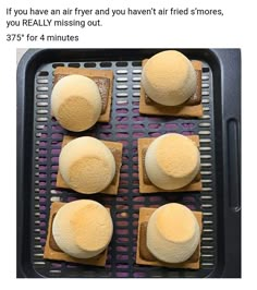 four doughnuts sitting on top of a baking sheet in an oven, with the words'if you have an air fryer and you havent