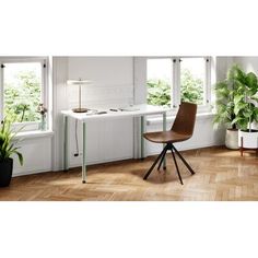 a chair and table in a room with plants on the windowsill, potted plant next to it