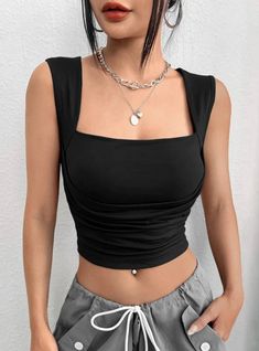 Revamp your weekend style with this distinctive top that's bound to make a statement. Crafted from a sleek black material, it showcases a unique bust detail and a trendy cropped length that exudes chicness. For a night out with your squad, style it with black jeans and clear heels to create an unforgettable and fashionable look that's sure to impress. Whether you're hitting the town or just chilling, this top is an excellent addition to your weekend wardrobe. Don't let this must-have piece slip away, as it's sure to become a staple in your collection. Version: slim typeLength: short (40cm < length ≤50cm)Pattern: solid colorPopular elements: wrinklesColor: blackSize: S,M,L,XL Slim Tank Top, 2000s Outfits, Looks Street Style, Weekend Style, Vest Top, Aesthetic Fashion, Cropped Tank Top, Black Tank Tops, Crop Tank