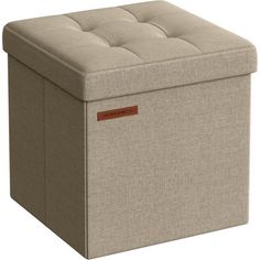 a beige storage box with buttons on the top and bottom, sitting in front of a white background