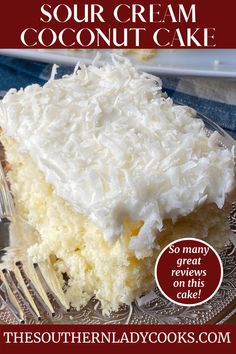 a close up of a piece of cake on a plate with the words sour cream coconut cake