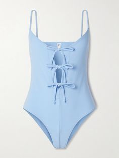 Lisa Marie Fernandez’s swimsuit is defined by a trio of ties through the front - adjust them to cinch the shape and coverage. It's made from stretchy crepe in a serene blue and has slim shoulder straps. Style it off the beach with high-rise jeans. Cute Tankinis For Women, Satin Swimsuit, Blue Bathing Suit Aesthetic, Shein Bathing Suits, Onepiece Bathingsuit, Blue Beachy One-piece For Pool, 2024 Swimsuit, Light Blue Bathing Suit, 80s Swimwear