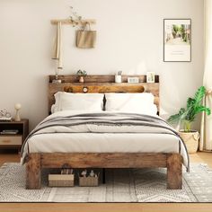 a bed sitting in a bedroom on top of a wooden floor next to a window