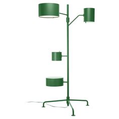 a green floor lamp with two lamps on it