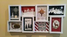 a wall mounted display with christmas cards on it