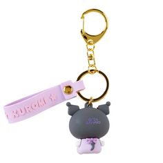 a keychain with a small animal on it's side and a name tag attached to it