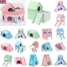 a bunch of toys that are in the shape of houses and stairs for children to play with