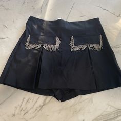 Zara Skort With Fringing Black Size Small 2407/535/800 Made In Morocco 63% Polyester 33% Viscose 4% Elastane Elegant Skort With Lined Skirt For Night Out, Elegant Skort For Night Out With Lined Skirt, Elegant Short Skirt For Parties, Chic Cocktail Bottoms With Short Length, Chic Short Cocktail Bottoms, Chic Short-length Cocktail Bottoms, Elegant Short Cocktail Bottoms, Elegant Party Skort In Short Length, Elegant Party Skort Short Length