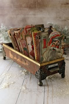 an old fashioned christmas card holder with santa claus on it's face and lots of cards