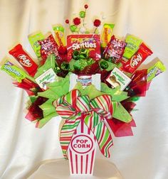 a bouquet of candy and candies in a gift box