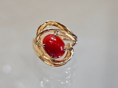 Circa 1985, a 14k yellow gold 9 x 7mm oval red carnelian cabochon ring size 6. Weight is 5.9 grams. Stamped 14k. Condition is very good. Thanks for looking.    ERA - Circa 1985, Vintage METAL / MATERIAL - 14k yellow gold  MARKINGS / HISTORY - Stamped 14k  CONDITION - The overall condition is very good! A true representation of 1980s-era jewelry! SIZE / MEASUREMENTS - 9 x 7mm oval red carnelian cabochon / size 6 / Weight is 5.9 grams. VINTAGE/ANTIQUE/HANDMADE - This item is VINTAGE. Add this timeless piece to your estate collection, to your wardrobe to jazz up any outfit, or gift it to an admirer of all things vintage and heirloom. Thanks for looking! DISCLAIMER - *Please note that the majority of vintage and antique items will reflect slight imperfections due to time, age, and previous use Red Cabochon Ruby Ring In 14k Gold, 14k Gold Red Cabochon Ruby Ring, 14k Gold Red Cabochon Ring, 14k Gold Cabochon Red Ring, 14k Gold Rings With Red Cabochon, Oval Cabochon Red Ruby Ring In 14k Gold, Red Ruby Oval Cabochon Ring In 14k Gold, Yellow Gold Carnelian Oval Cabochon Ring, Yellow Gold Oval Cabochon Carnelian Rings