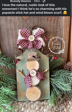 an image of a wooden snowman with plaid bows on it's head and the words love the natural, rustic look of this christmas decoration