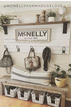 a bench with some baskets on top of it and a sign that says menlly above it