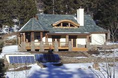 a house with a solar panel on the roof