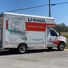 a delivery truck parked in a parking lot