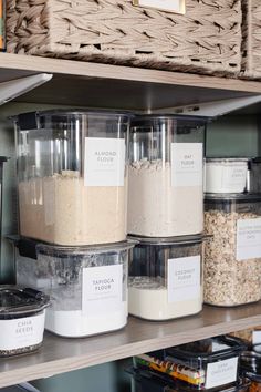 the shelves are filled with different types of food in plastic containers and labeled labels on them