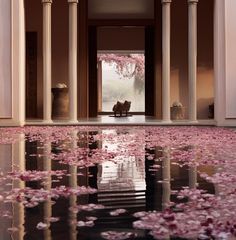 the floor is covered in pink flowers and columns