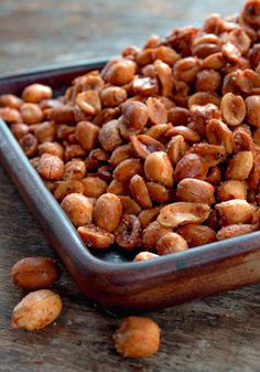 some nuts are in a bowl on a table