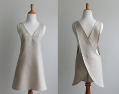 two images of a dress on a mannequin stand, one in grey and the other in beige