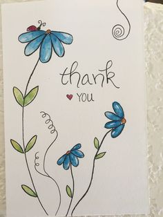 a thank you card with blue flowers and a ladybug on the top, says thank you