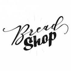 the word bread shop written in black ink