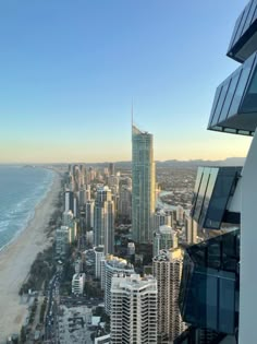 an aerial view of the beach and city from a high rise building in surfers paradise