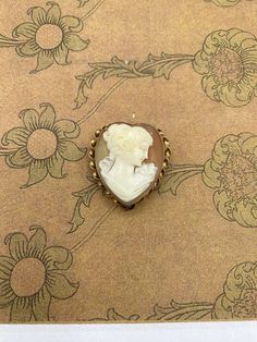 Vintage Heart Cameo  Brooch Pendant 1 inch wide 1.25 inches tall We Will Insure Your Package For Full Value Message us with any questions Heirloom Brooches With Cabochon For Gifts, Antique Heart Brooch For Wedding, Antique Heart-shaped Wedding Brooch, Victorian Cameo Brooch For Anniversary, Heirloom Cameo Brooch Gift, Heirloom Cameo Brooches As Gift, Heirloom Cameo Brooches For Gifts, Vintage White Pendant Brooches, White Antique Brooches As A Gift