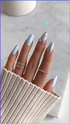 Step into 2024 with Winter Nails: Twilight Frost Manicure. Elevate your seasonal style with chic and enchanting nail designs inspired by the mesmerizing twilight frost. From icy blues to shimmering silver, these nails capture the essence of winter elegance. Make a statement and let your fingertips twinkle with the magical charm of winter in 2024. #WinterNails #nails #nailart #manicure ❄️💅✨ January Design, Rings Tutorial, Art Alternative, Snow Nails, Alternative Aesthetic, Baby Blue Nails, Share Video, Winter Manicure, January Nails